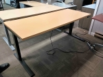 PRE-OWNED ELECTRIC HEIGHT DESK 28X70