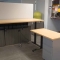 PRE-OWNED ELECTRIC HEIGHT DESK WITH PRIVACY PANEL (Image 2)